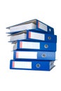 Pile of blue ring binders.