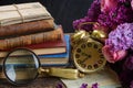 Pile of books with clock Royalty Free Stock Photo