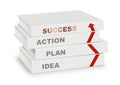 Pile of books covered idea, plan,action, success and arrow, busi