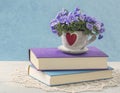 Pile of books and flowers Royalty Free Stock Photo