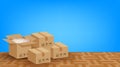 Pile boxes brown placed on the parquet floor in the blue room empty, cardboard carton box and copy space ad, stack cardboard box Royalty Free Stock Photo
