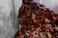 pile of bricks lying around, ruined wall in abandoned building, shelter, concept of destruction of buildings from bombing,