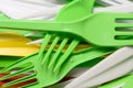 Pile of bright yellow, green and white used plastic kitchenware appliances Royalty Free Stock Photo