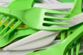 Pile of bright yellow, green and white used plastic kitchenware appliances Royalty Free Stock Photo