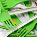Pile of bright yellow, green and white used plastic kitchenware appliances Royalty Free Stock Photo