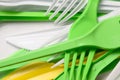 Pile of bright yellow, green and white used plastic kitchenware appliances Royalty Free Stock Photo