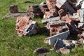 Pile of broken red bricks on construction site, garbage Royalty Free Stock Photo