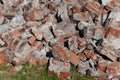 Pile of broken red bricks on construction site, garbage Royalty Free Stock Photo