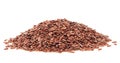 Pile of brown flax seeds isolated on white background. Group of linseeds Royalty Free Stock Photo