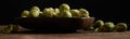 Pile of Brussels sprout in bowl on table Royalty Free Stock Photo