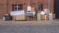 Pile of bulky waste with furniture on the side of the road Royalty Free Stock Photo