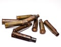 A pile bullet shells on a white background Royalty Free Stock Photo