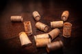 A pile empty bullet shells on a wooden background