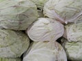 A pile of cabbage vegetables on display at a traditional market. Royalty Free Stock Photo