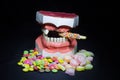 Pile of candy whit broken tooth