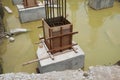 Pile cap and column stump under construction at the construction site.