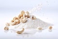 A pile of salt and cashew nuts on a white background Royalty Free Stock Photo