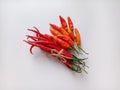 Cayenne pepper and curly chili on white background Royalty Free Stock Photo