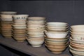 Pile of ceramic rice bowls and tea bowls close-up Royalty Free Stock Photo
