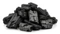 Pile of charcoal pieces isolated on white background Royalty Free Stock Photo