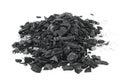 Pile of charcoal pieces isolated on white background. Wood coal Royalty Free Stock Photo
