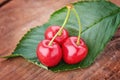 Cherry - Heap of fresh berries on wood.
