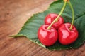 Cherry - Heap of fresh berries on wood.