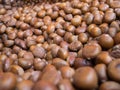 Pile of chestnuts roasted for sale in a market