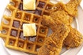 Pile of Chicken and Waffles Isolated on a White Background Royalty Free Stock Photo