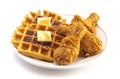 Pile of Chicken and Waffles Isolated on a White Background Royalty Free Stock Photo