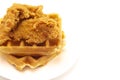 Pile of Chicken and Waffles Isolated on a White Background Royalty Free Stock Photo