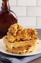 Pile of Chicken and Waffles on a Rustic Wooden Counter Royalty Free Stock Photo