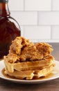 Pile of Chicken and Waffles on a Rustic Wooden Counter Royalty Free Stock Photo