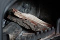 A pile of chipped chips and oak bark for lighting a fire in a fireplace and heating a cold room