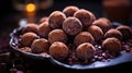 A pile of chocolate covered truffles on a plate with some candles, AI Royalty Free Stock Photo