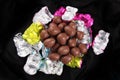 Pile of Chocolate easter eggs unwrapped against a black backgound Royalty Free Stock Photo