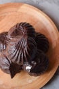 Chocolate marshmallows on a wooden plate Royalty Free Stock Photo