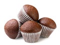 Pile of chocolate muffins close-up on a white background. Isolated Royalty Free Stock Photo
