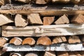 Pile of chopped firewood. Stacked logs of different size. Royalty Free Stock Photo