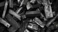 Pile of chopped firewood. textured black and white photo. monochrome image of stacked wood logs. ideal for backgrounds Royalty Free Stock Photo