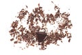 Pile chopped, milled chocolate shavings on white background.