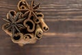 Bunch of Cinnamon Sticks and Star Anise on the Wooden Background. Copy Space Royalty Free Stock Photo