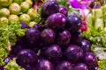 Pile of clean and fresh purple eggplants in the market