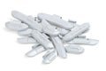 Pile of clip-on zinc tire weights over white