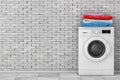 Pile of Clothes over Modern Washing Machine. 3d Rendering