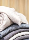 closeup rolled beige cashmere woollen blanket Royalty Free Stock Photo