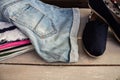 Pile of the clothing on a table shoes Royalty Free Stock Photo