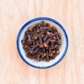 Pile cloves in bowl Royalty Free Stock Photo