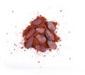 Pile cocoa powder and beand isolated on white background