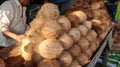 Pile of coconuts in the food market of India
